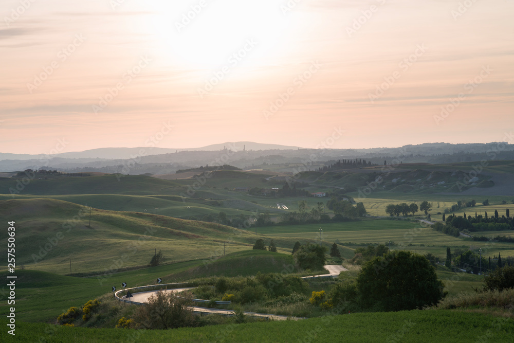 Val d'Orcia (or Valdorcia) landscape in Tuscany at sunset, a very popular travel destination in Italy