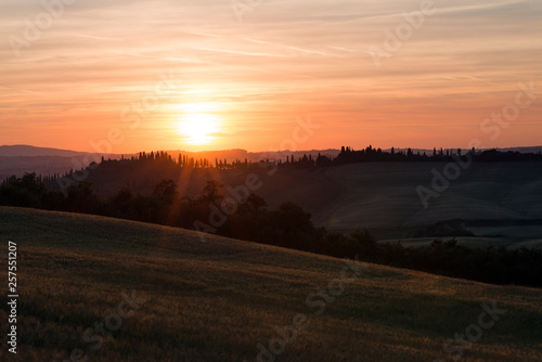 Val d'Orcia (or Valdorcia) landscape in Tuscany at sunset, a very popular travel destination in Italy