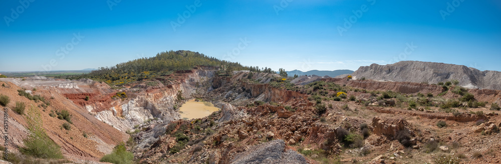 View from the top of the open exploitation mine located in the town of La Zarza, Alange, Extremadura, Spain View from the top of the open exploitation mine located in the town of La Zarza, Alange, Extremadura, Spain