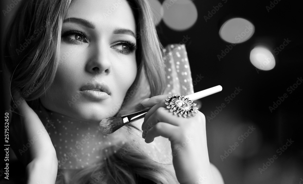 Obraz premium Beauty woman hold makeup professional tools mascara eyelashes brush for makeup have clear healthy face portrait 