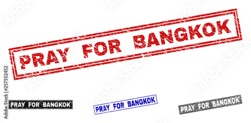 Grunge PRAY FOR BANGKOK rectangle stamp seals isolated on a white background. Rectangular seals with grunge texture in red, blue, black and grey colors.