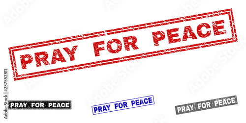 Grunge PRAY FOR PEACE rectangle stamp seals isolated on a white background. Rectangular seals with grunge texture in red, blue, black and gray colors.