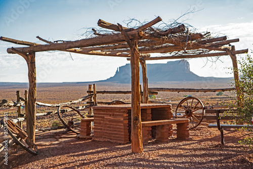 A shelter made from poles and sticks for natives to use in the desert.