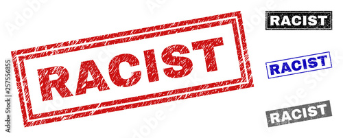 Grunge RACIST rectangle stamp seals isolated on a white background. Rectangular seals with grunge texture in red, blue, black and grey colors.