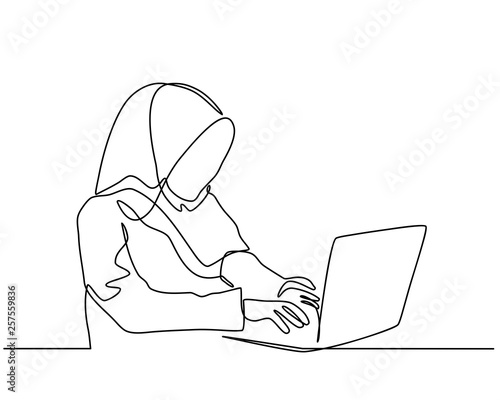 continuous line drawing of professional young muslim business woman using mobile digital tablet computer work and writing work plan on personal notebook isolated on white background