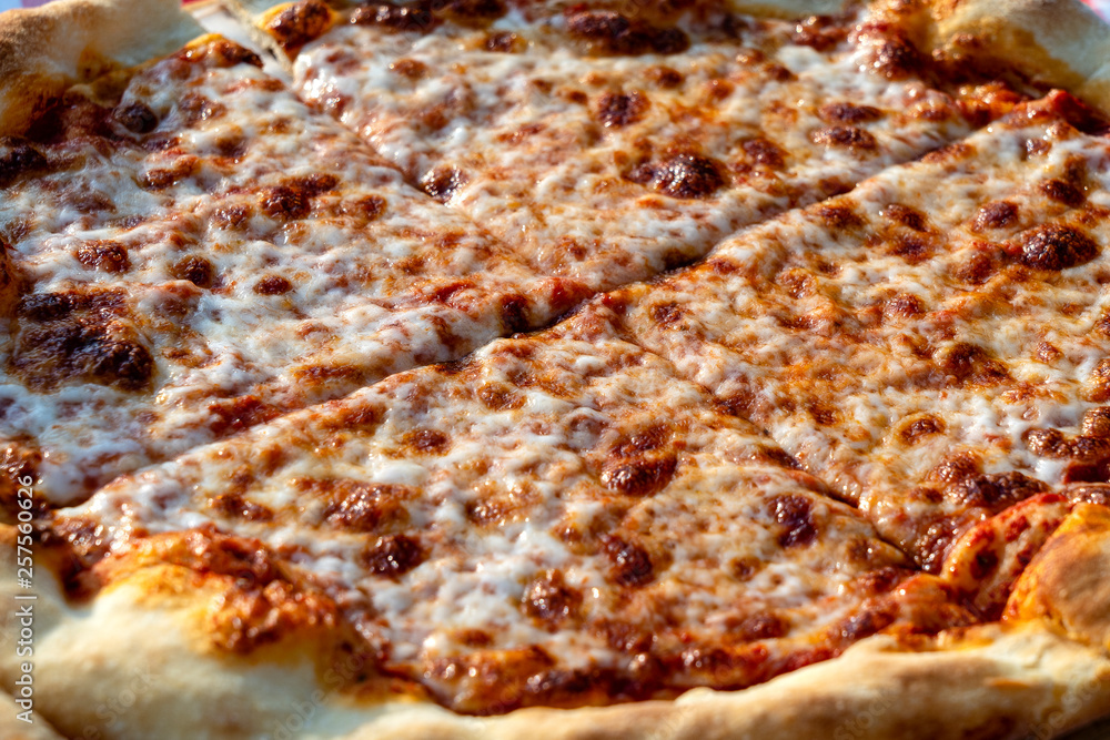 Pizza with cheese for sale at the street food market in island Koh Phangan, Thailand . Closeup Pizza with cheese for sale at the street food market in island Koh Phangan, Thailand . Closeup