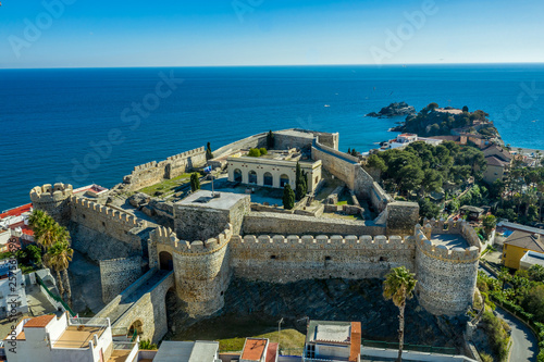 Almunecar aerial view of popular Mediterranean beach town with medieval castle in Spain photo