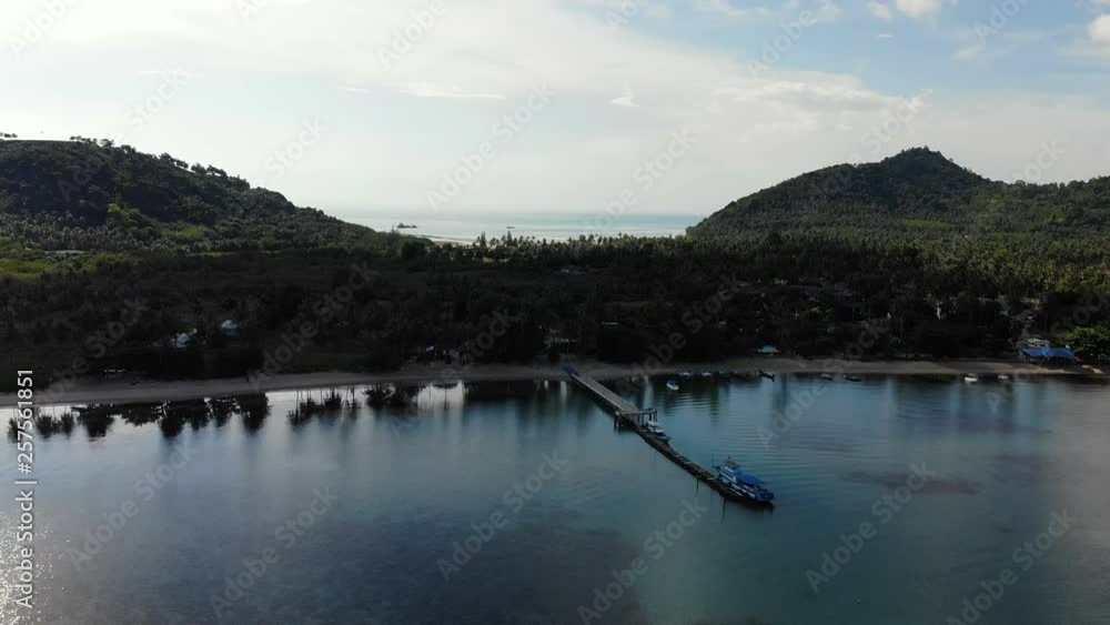 Aerial view of tropical sea and beach on white cloud and blue sky Aerial view of tropical sea and beach on white cloud and blue sky