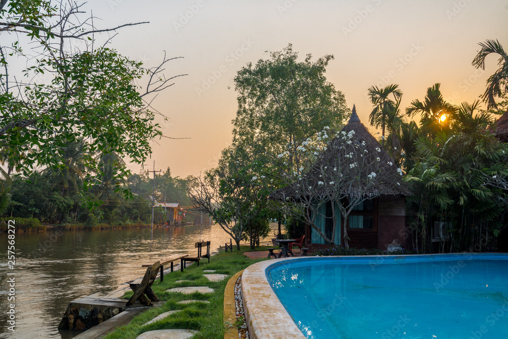 The hut beside of canel and pool in the countryside, Traveling in Thailand