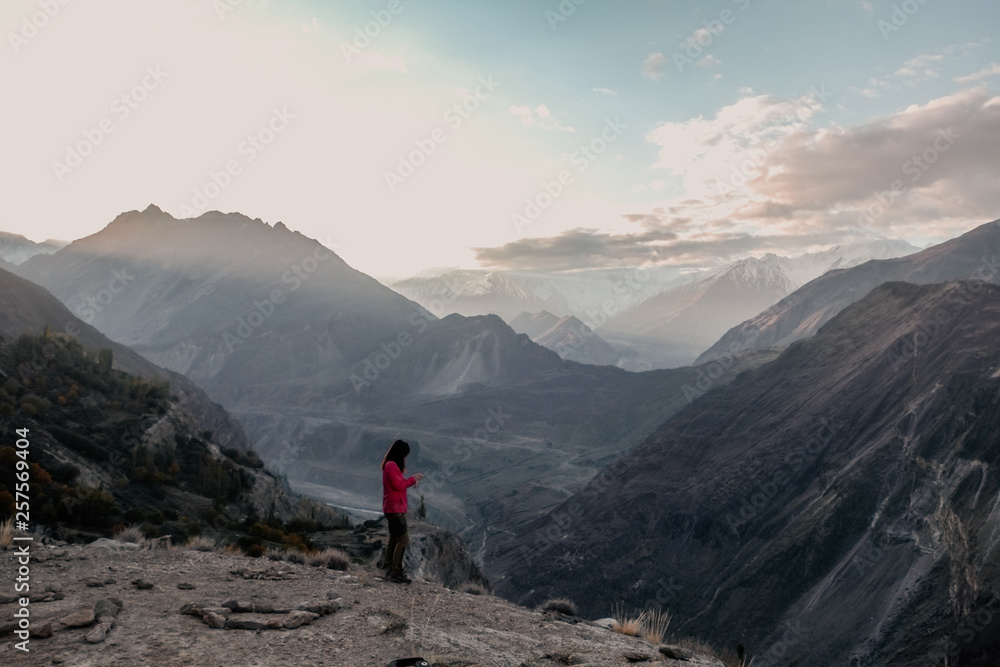 Landscape view of sunrise over Karakoram mountain range in Hunza Nagar valley. Eagle's nest viewpoint. Gilgit Baltistan, Pakistan. Landscape view of sunrise over Karakoram mountain range in Hunza Nagar valley. Eagle's nest viewpoint. Gilgit Baltistan, Pakistan.