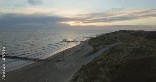 Aerial: The beach between Vlissingen and Dishoek during sunset. photo