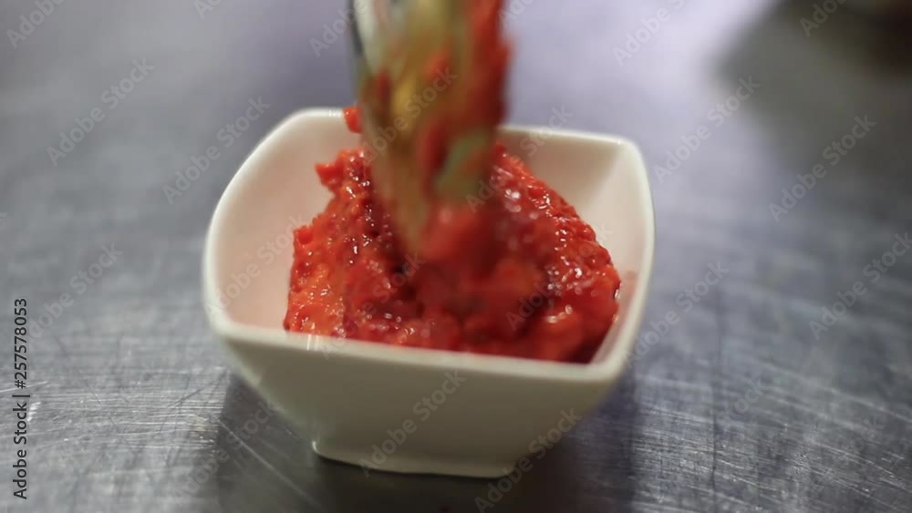 Serving Balkan Ajvar Mashed Tomato Sauce in Small Bowl Restaurant Food Cruisine Serving Balkan Ajvar Mashed Tomato Sauce in Small Bowl Restaurant Food Cruisine