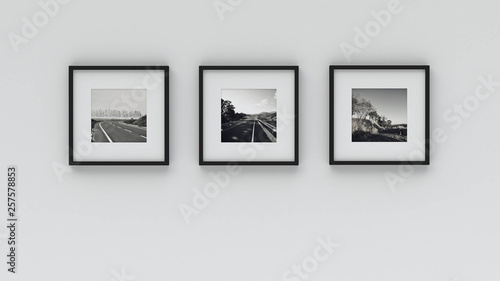 picture in photo frame on wall.Concept country road (3d rendering)