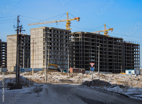 Wallpaper Mural Buildings under construction. Kazakhstan (Ust-Kamenogorsk). Residential buildings. Construction cranes. Cranes and buildings. New residential area. Construction site. Concrete frame Torontodigital.ca