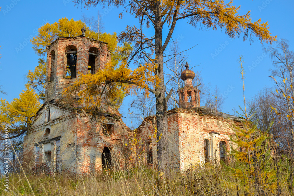 abandoned brick church on spring background