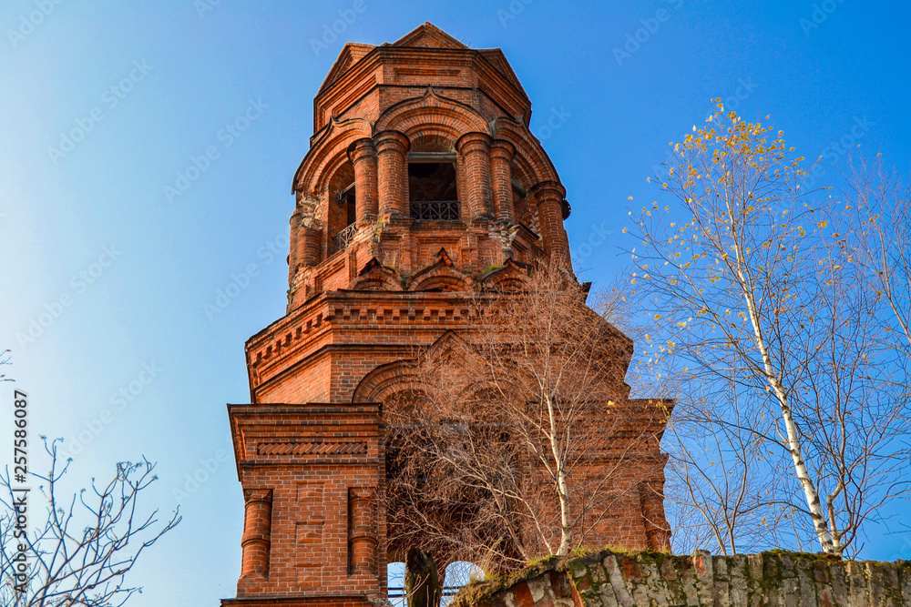 old brick church with a destroyed bell