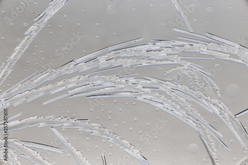 Snow patterns on glass as an abstract background