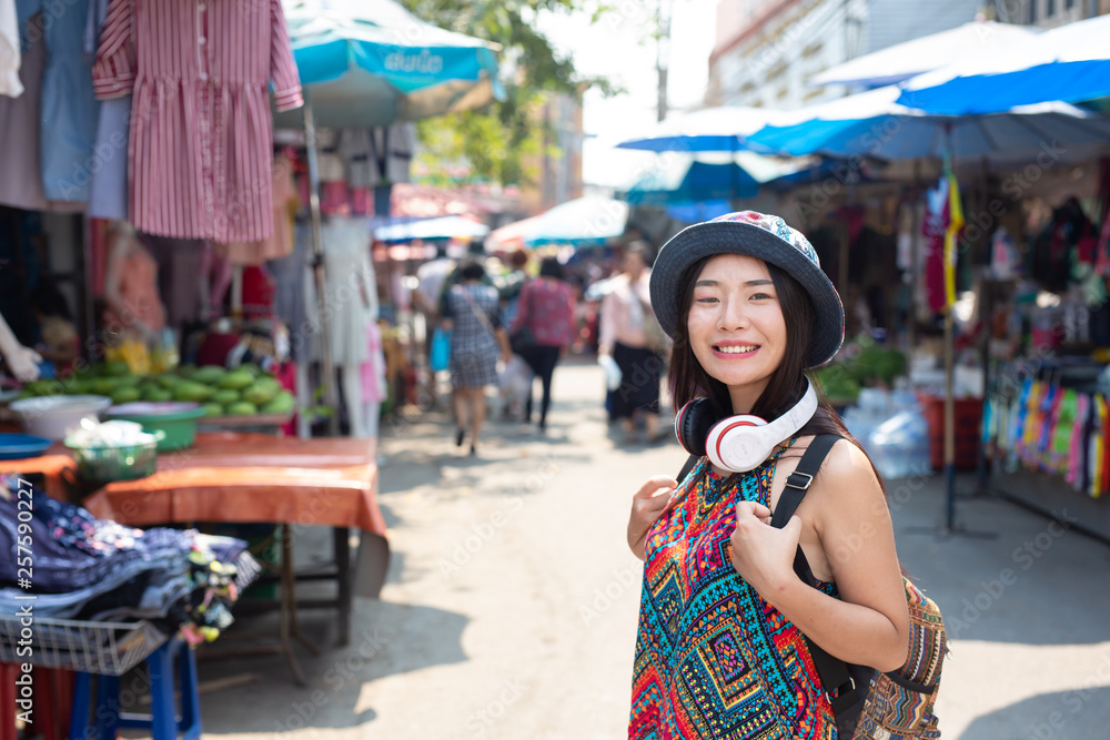 Women are happy to walk shopping at the market. Tourism concept Women are happy to walk shopping at the market. Tourism concept