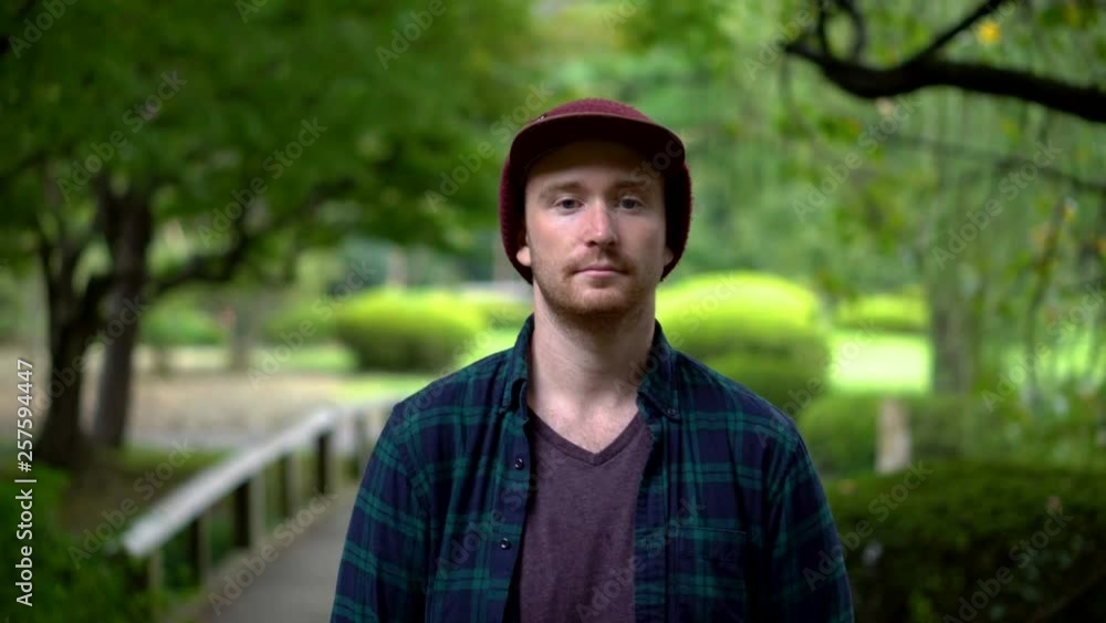 Portrait of Caucasian Man With Japanese Garden in Background Portrait of Caucasian Man With Japanese Garden in Background