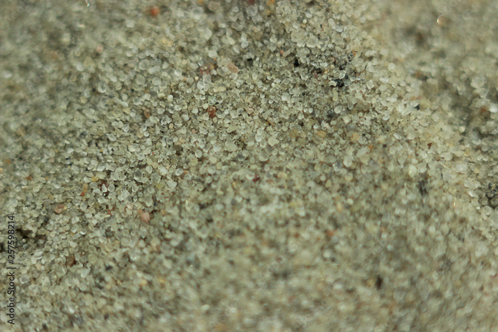 Gray sand surface with a cut line. Gray sand texture. Background sand. Seamless texture of sand. Gray sand surface with a cut line. Gray sand texture. Background sand. Seamless texture of sand.