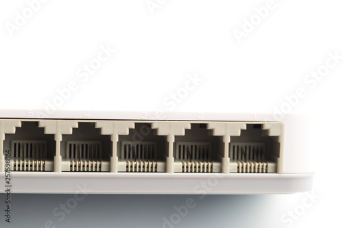 Connecting network cables to switch routers using RG-45 connectors photo