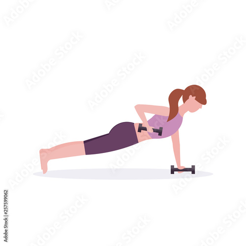 sports woman doing dumbbells plank exercise girl lifting weight working out in gym crossfit training healthy lifestyle concept flat white background horizontal