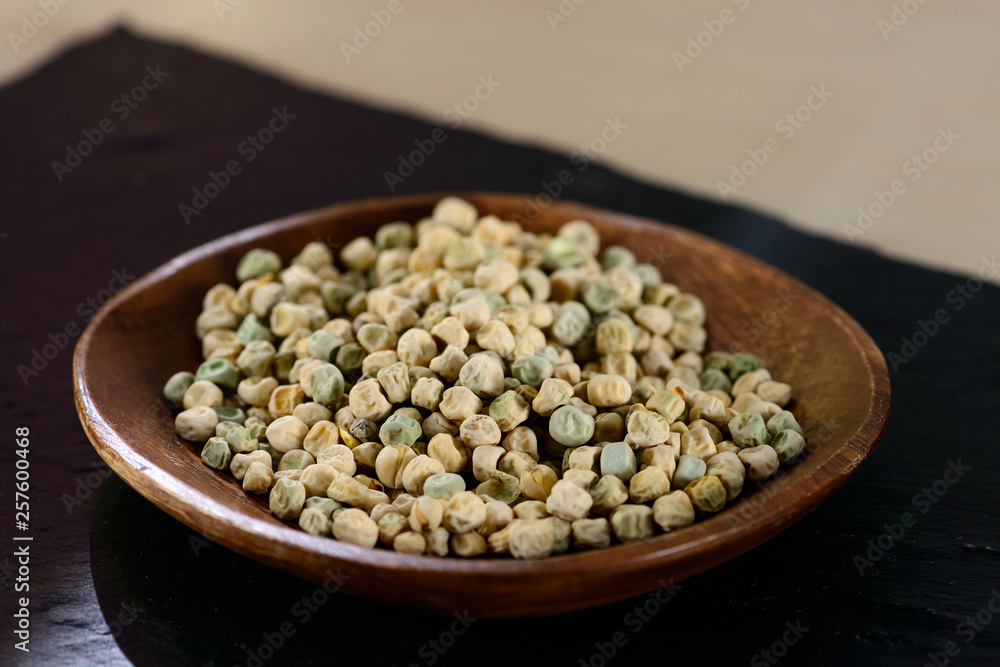 microgreen peas grain and germinated sprout on a light background microgreen peas grain and germinated sprout on a light background