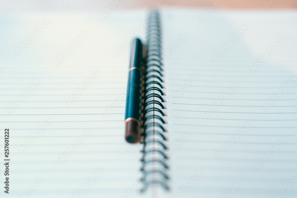 Notebook and pen in composition in black and white - Image Notebook and pen in composition in black and white - Image