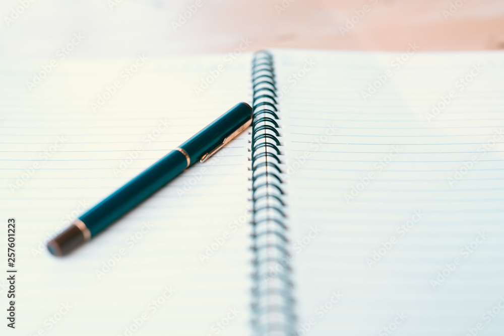 Notebook and pen in composition in black and white - Image Notebook and pen in composition in black and white - Image