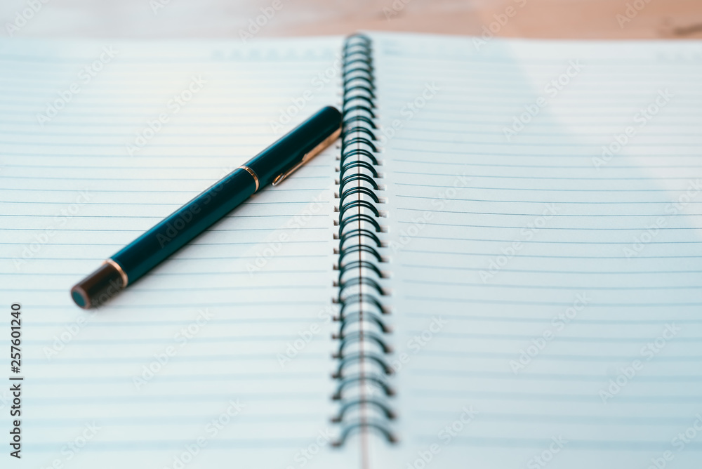 Notebook and pen in composition in black and white - Image Notebook and pen in composition in black and white - Image