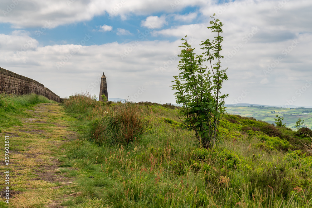 Clouds over Wainman's Pinnacle near Cowling, North Yorkshire, England, UK