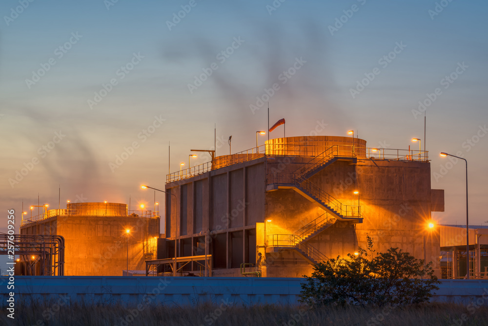 Obraz premium power plant at sunset.