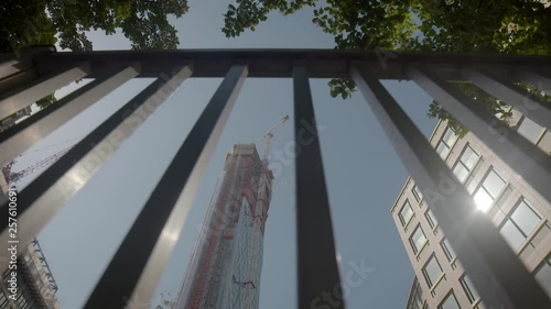 Street view of construction site of skyscraper in Canary Whar, financial district of London, England, UK photo