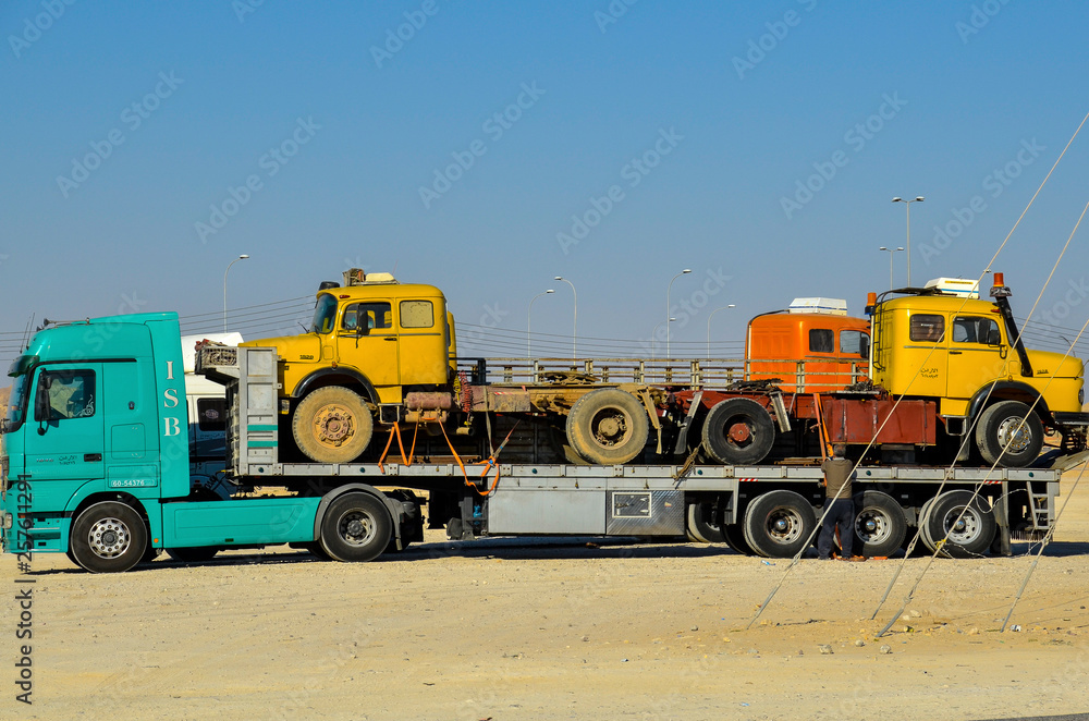 SALALAH OMAN Colorful trucks at gas station