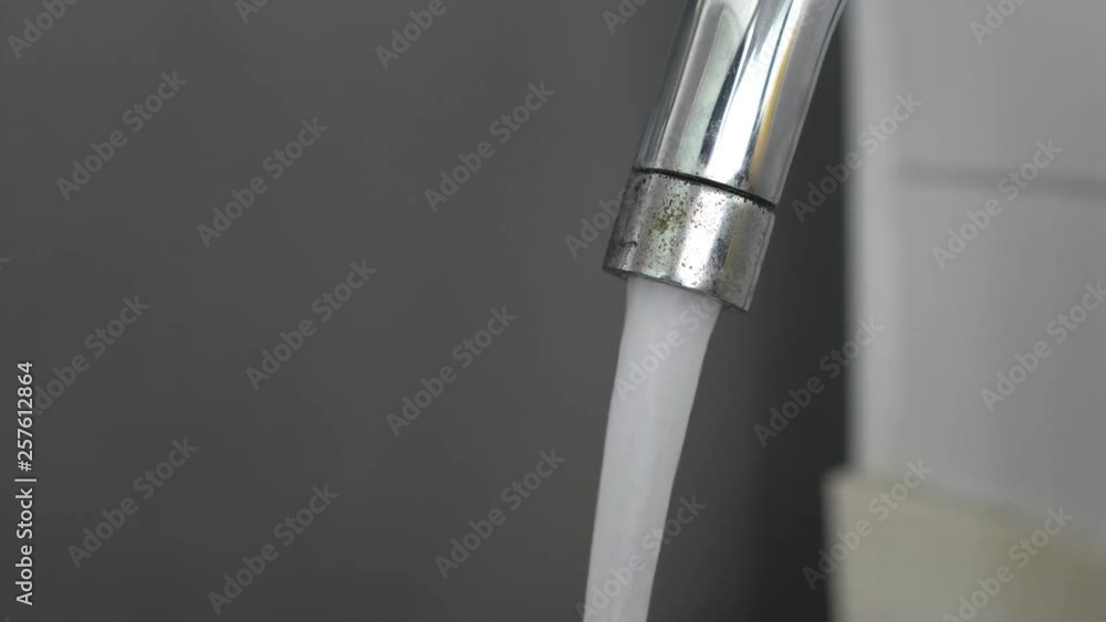 running water from sink tap, close up shot, cleaning concept running water from sink tap, close up shot, cleaning concept