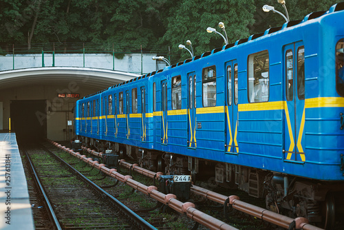 open-type Dnipro station and subway train approaching to the platform for passenger landing