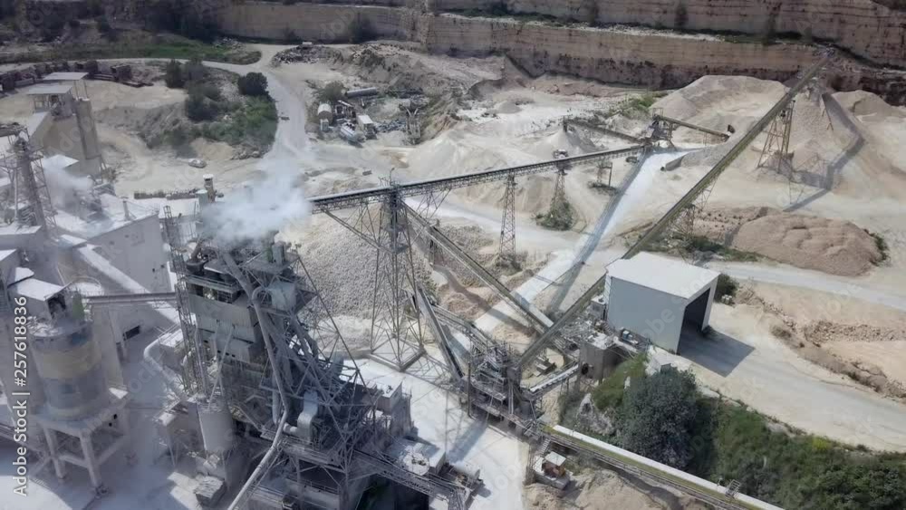 Large Quarry during work hours - Aerial tour. Large Quarry during work hours - Aerial tour.