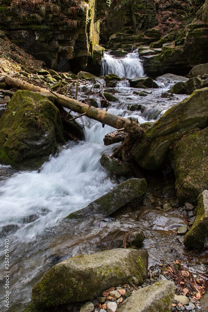 mountain waterfall among big stones mountain waterfall among big stones