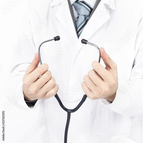closeup.a medical practitioner holding a stethoscope