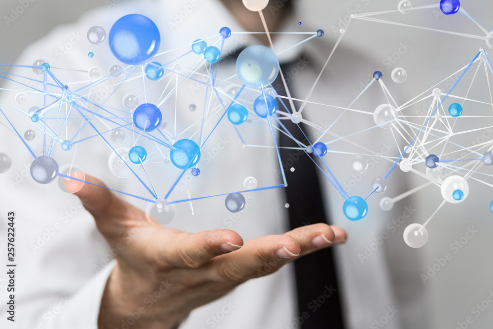 Businessman holding flying network connection Businessman holding flying network connection