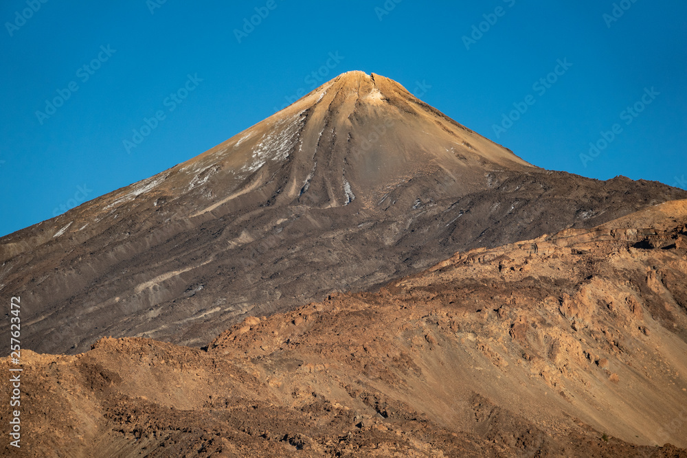 Teide volcano iconic crater against blue sky