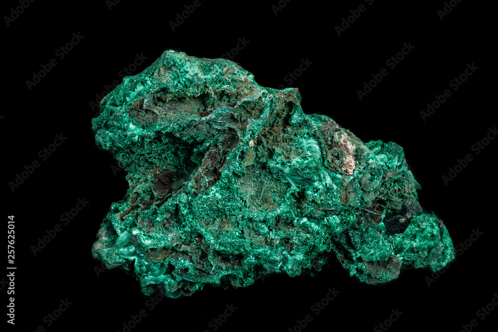 Macro of a mineral stone Malachite on a black background Macro of a mineral stone Malachite on a black background
