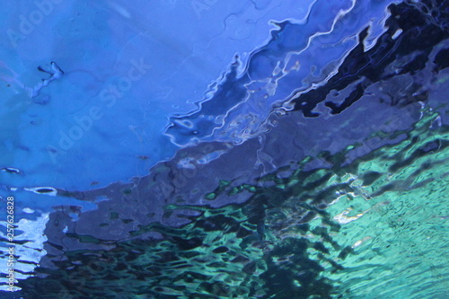 blue abstract background/the reflection of the water in the aquarium