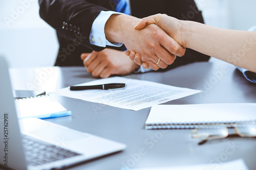 Business people shaking hands, finishing up a meeting