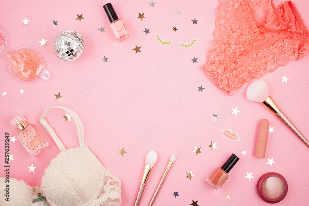 Flat lay with glamour girls accessories over pink background Flat lay with glamour girls accessories over pink background
