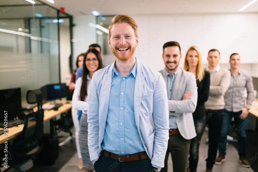 Portrait of business team posing in office Portrait of business team posing in office