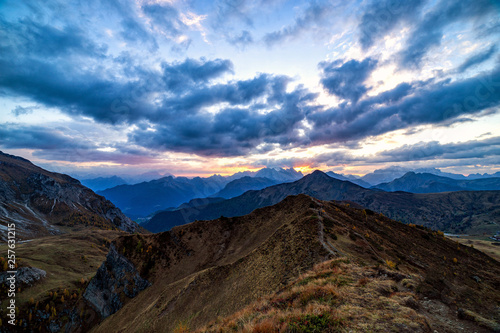 Beautiful sunset shot of majestic Dolomites mountains in Italian Alps. Landscape shot of high rocky mountains in the the Italian Dolomites during Autumn time.