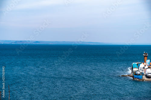 Vladivostok, Russia - 24 March, 2019: View of the city embankment and amusement park © rdv27