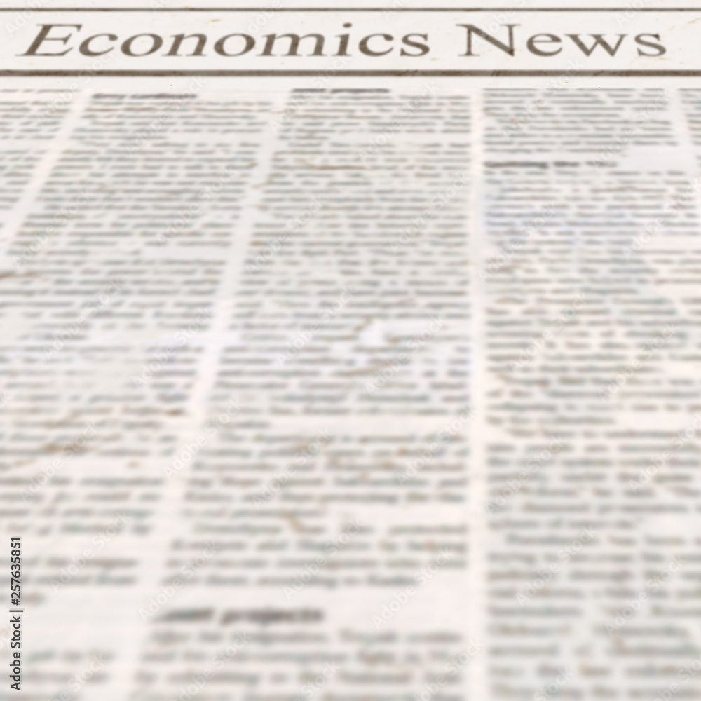 Obraz premium Newspaper with headline Economics News and old unreadable text