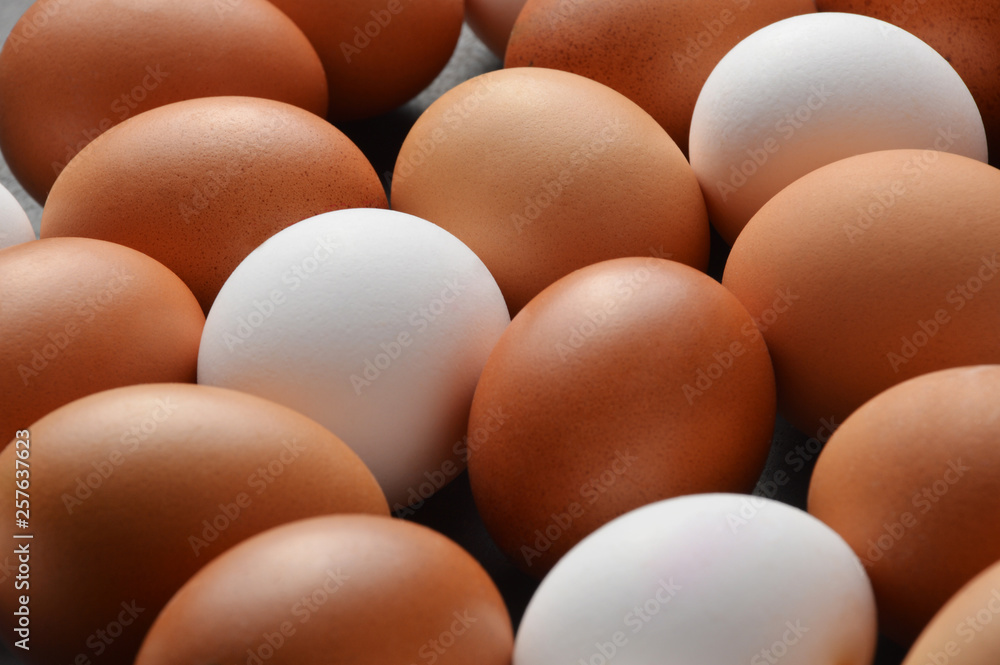 Group of eggs on the black wood background 